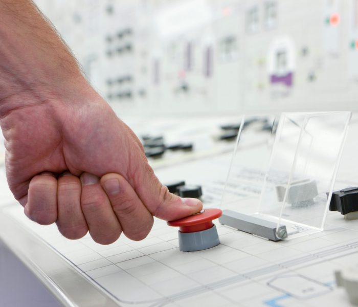 close-up-shot-of-a-hand-pushing-a-red-emergency-bu-2026-01-11-09-52-28-utc