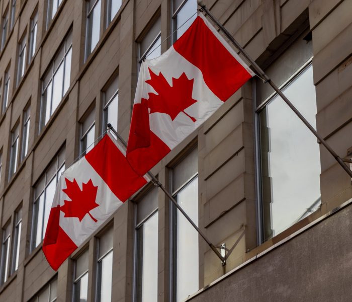Canadian flags on building in Ottawa downtown, Ontario in Canada.